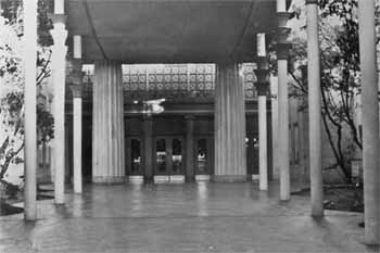 Forecourt and main entrance doors with the 1940 canopy, designed by S. Charles Lee, overhead (JPG)