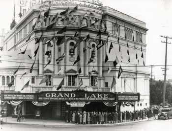 Moviegoers line up outside the theatre in 1927, courtesy <i>Oakland Public Library</i> (JPG)