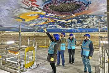 Capital Theatres staff tour the “dancefloor” just underneath the ceiling of the theatre’s auditorium