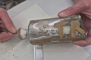 The bottle being examined by the Scottish Conservation Studio, photo courtesy Capital Theatres