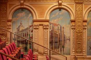 Two of the 12 auditorium murals by artist Joseph Knowles
