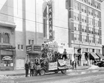 Men pose on a truck for the theatre’s opening night in November 1930, courtesy <i>Denver Public Library</i> (JPG)