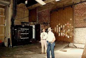Downstage Right showing original electric switchboard and Loading Door; date unknown but between 1968 and 1991 - courtesy <i>Orpheum Theatre crew / IATSE Local 336</i> (JPG)